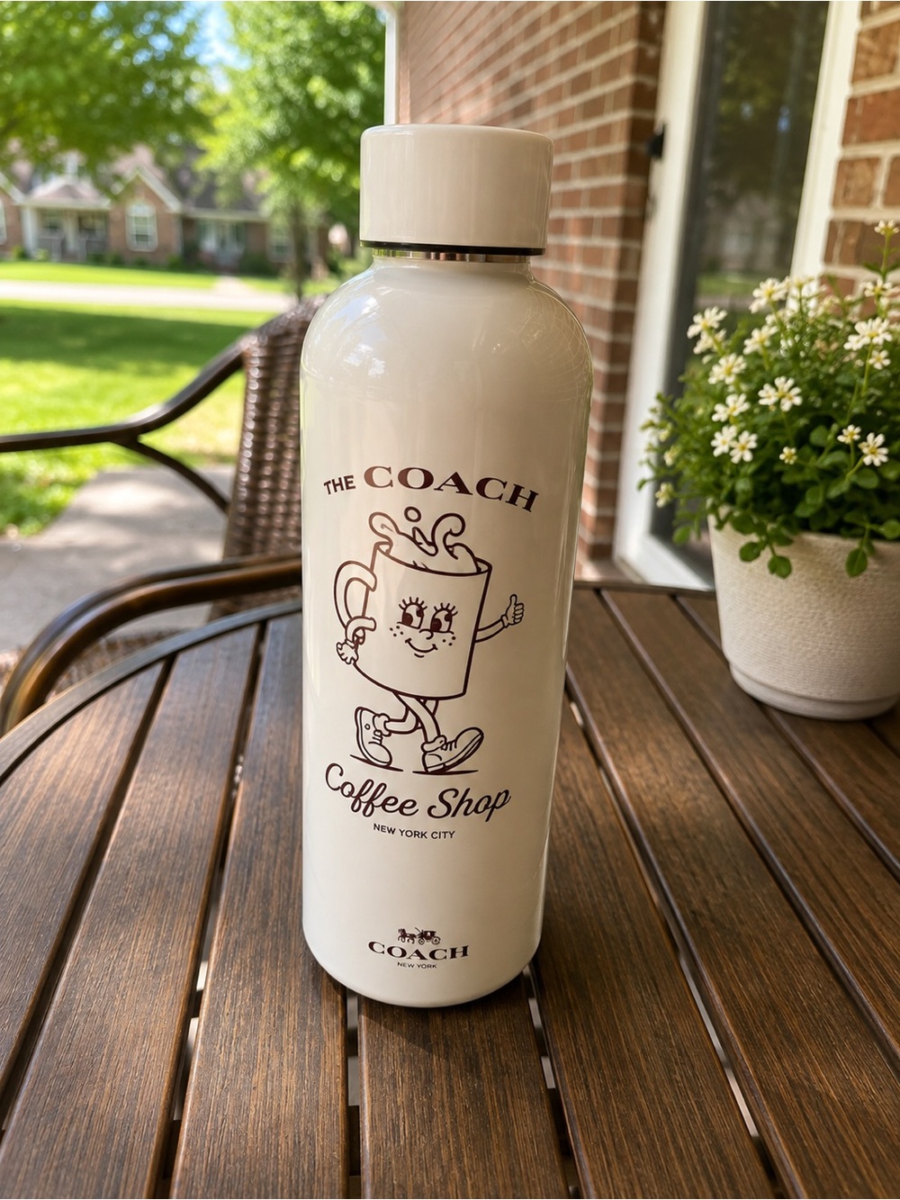 Coach Cream Coffee Shop Graphic Travel Bottle